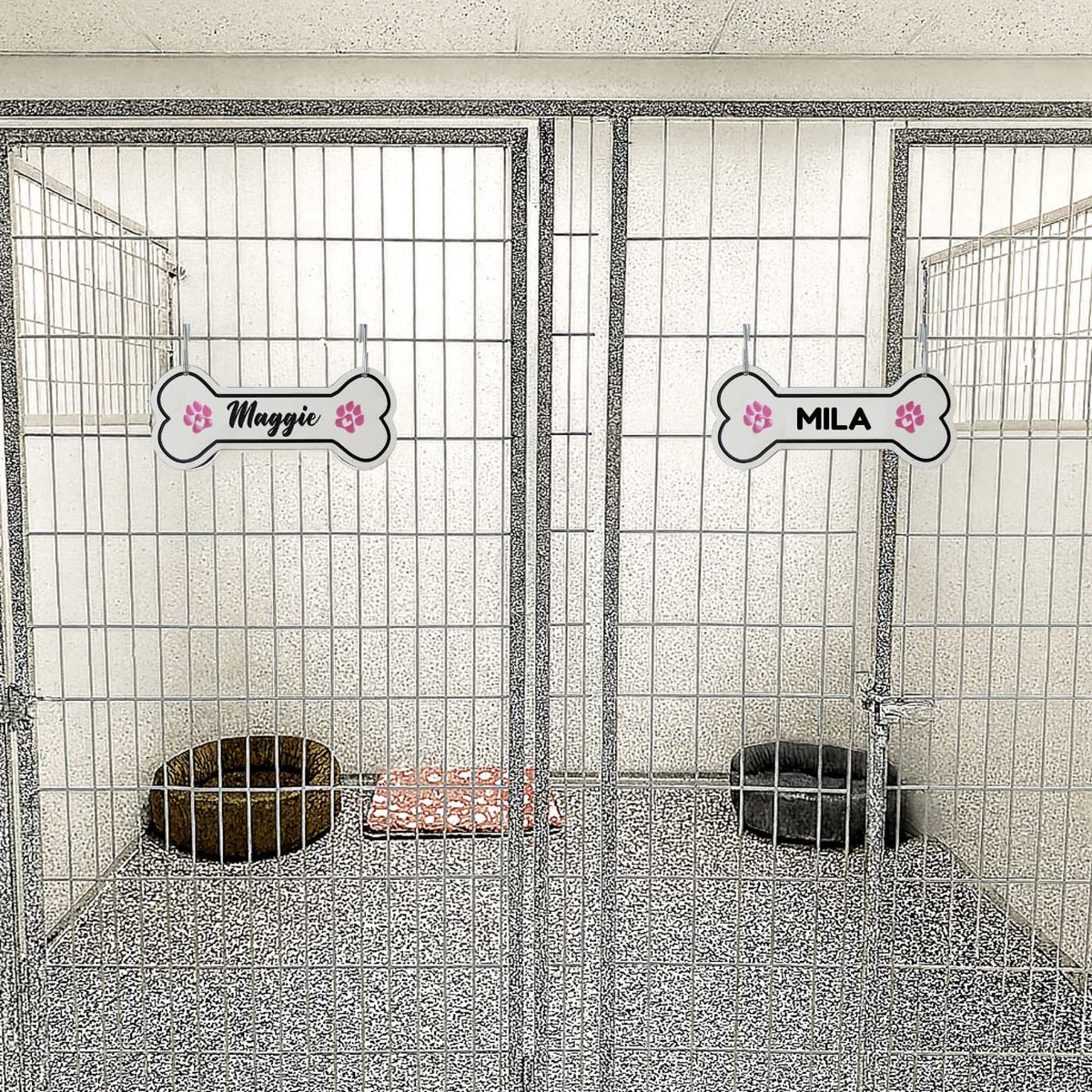 Personalized Noble Heritage dog crate tag on kennel door